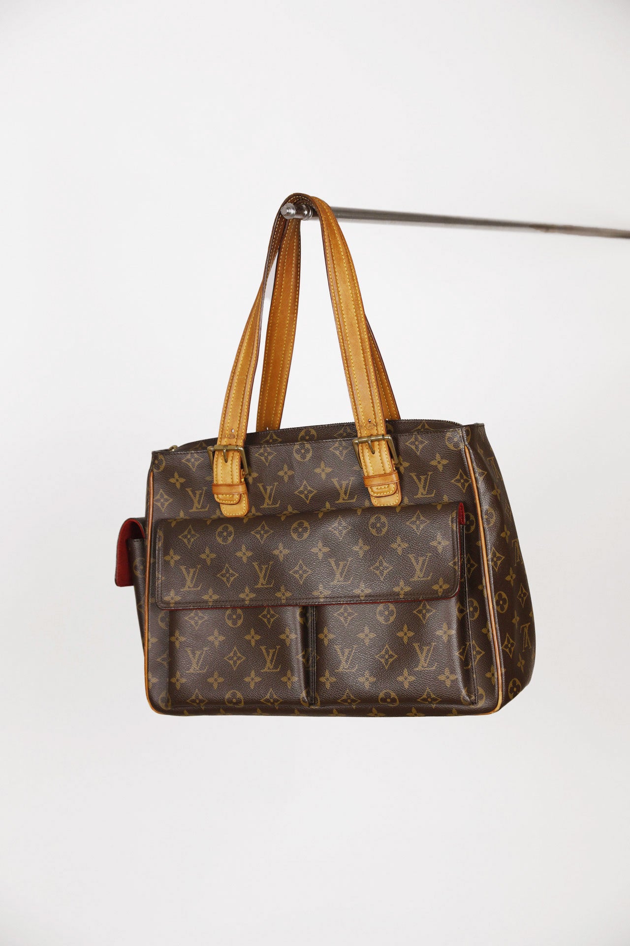Hauptansicht der Monogram pre-owned Louis Vuitton Multiplicity Cote PVC – elegantes Statement-Piece.