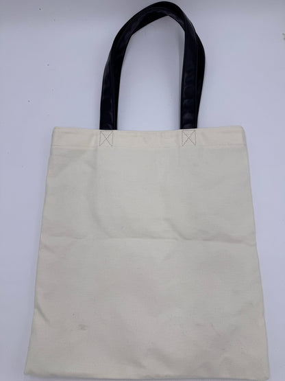 Rückseite der Beige preloved Saint Laurent Canvas Totebag – klassisch & zeitlos.