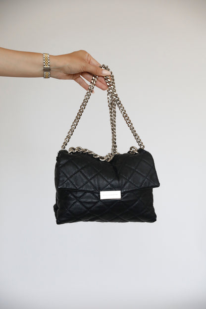 Hauptansicht der schwarz secondhand Stella McCartney Crossbody (Allegra) – elegantes Statement-Piece.