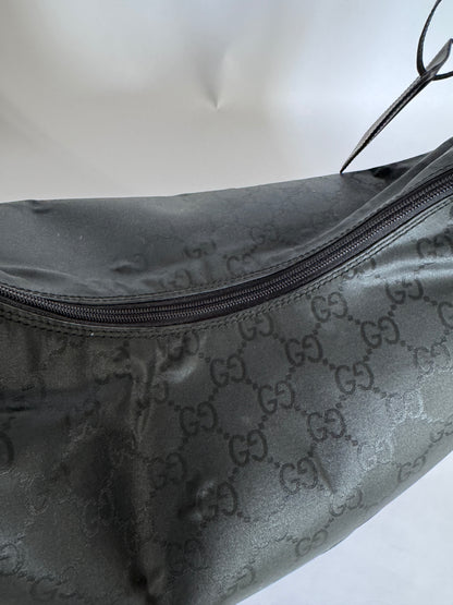 Metallelemente der Gucci Reisetasche (schwarz), hochwertig verarbeitet.